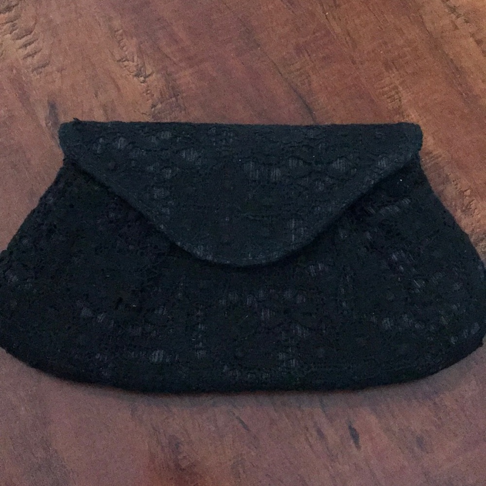 Lauren Merkin lace clutch